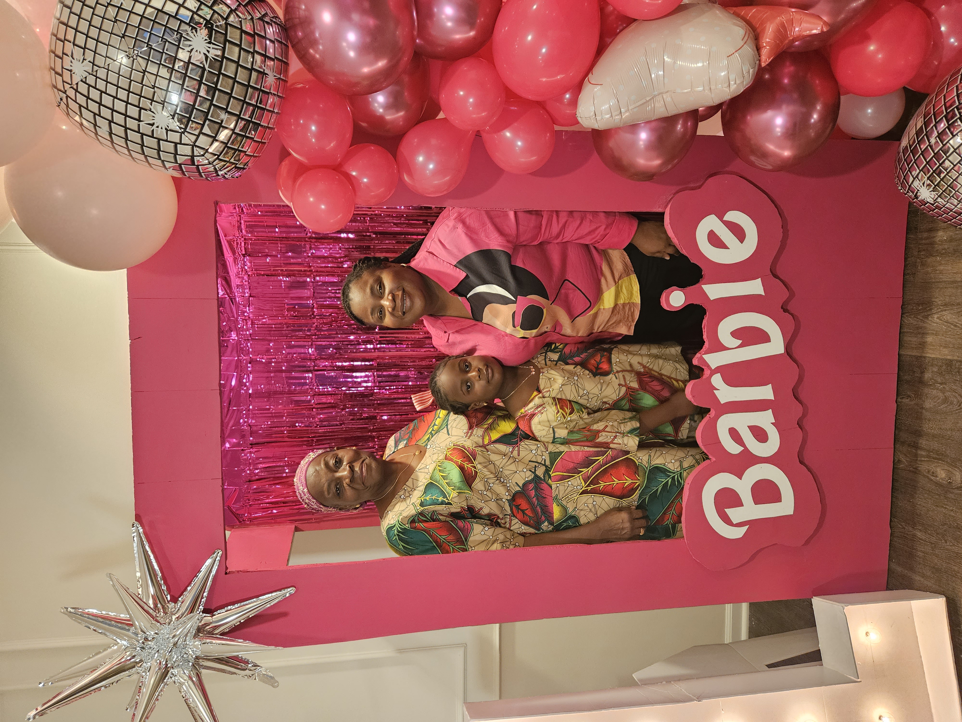 Pink balloon garland with silver disco ball accents